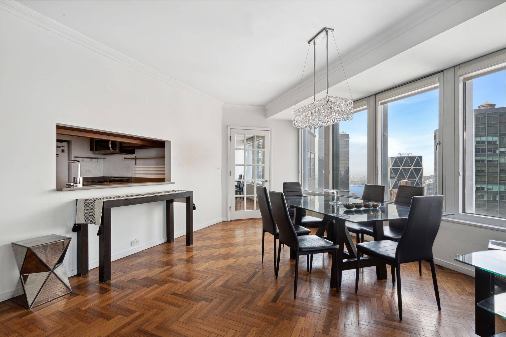 Experience breathtaking views from this stunning condominium located on a high floor, boasting floor to ceiling windows that offer sweeping vistas of the North and West.
