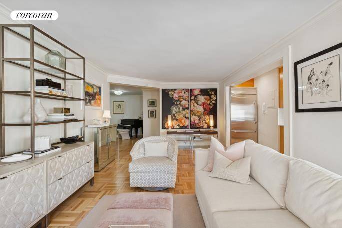 Newly listed, sprawling three bedroom three bath postwar cooperative has a grand entrance foyer that presently, comfortably holds a baby grand piano.