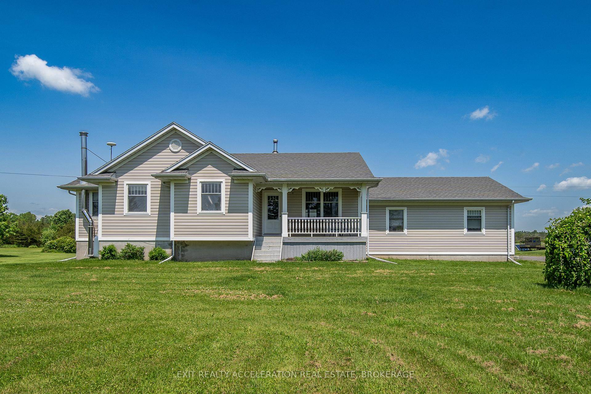 This charming three bedroom, two bathroom home sits on 1.
