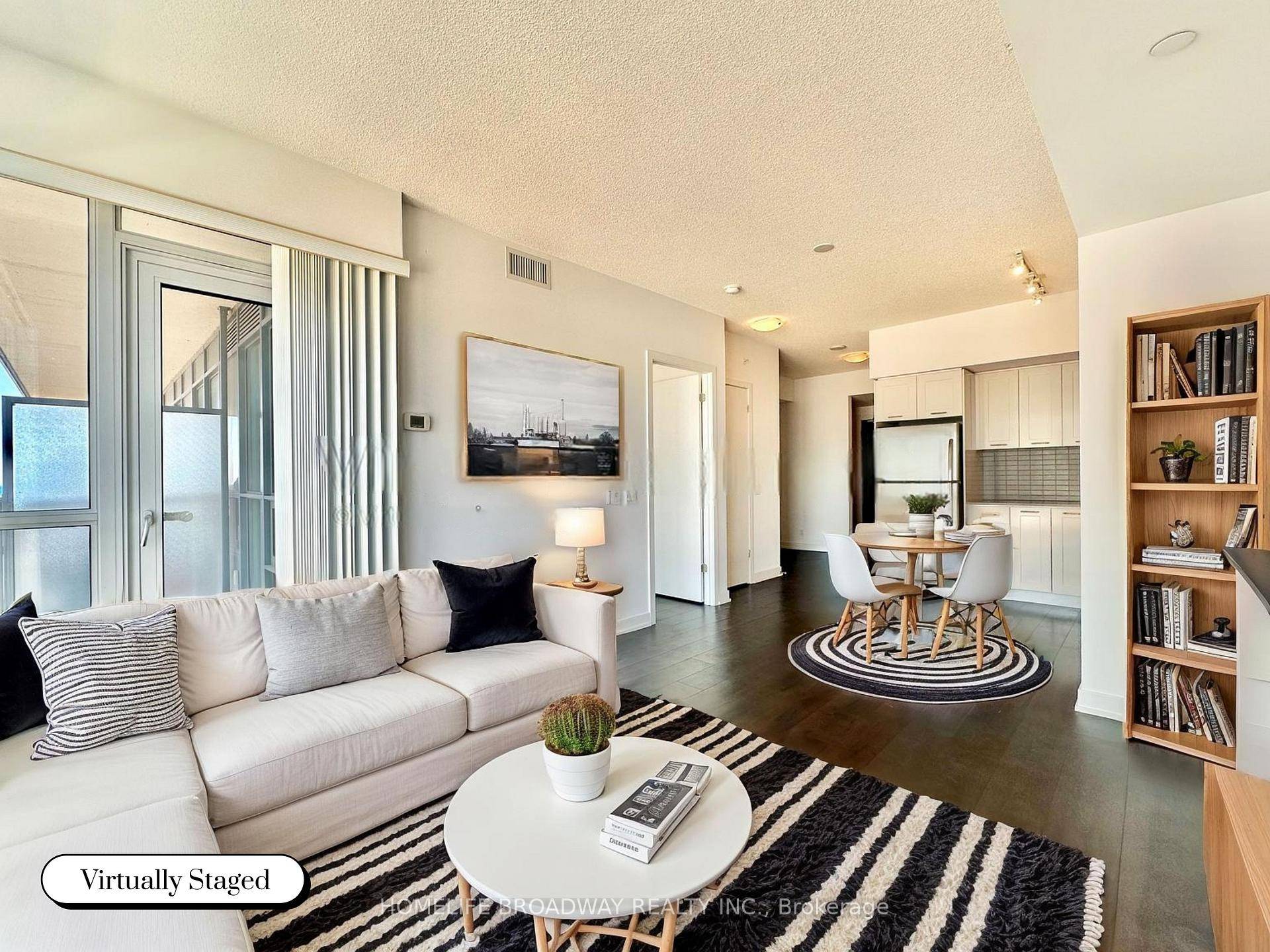 Enjoy A Clear Peaceful Morning Sunrise Plus a Glimpse of Lake Ontario from this Sun Filled Spacious 16th Floor, South East Facing 1 Bedroom Den Unit !