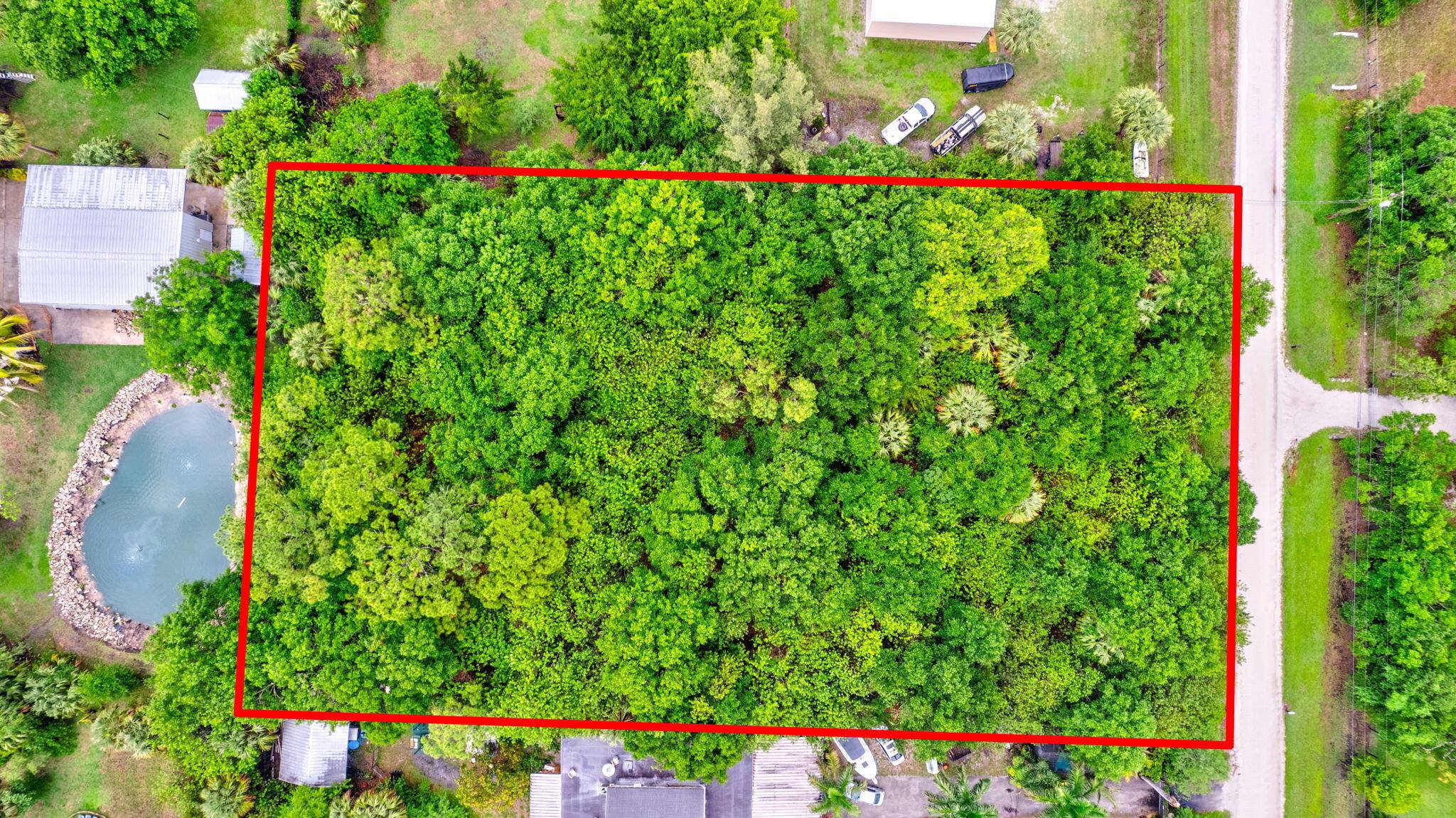COME SEE THIS VACANT LOT TUCKED AWAY IN QUIET JUPITER FARMS FLORIDA.