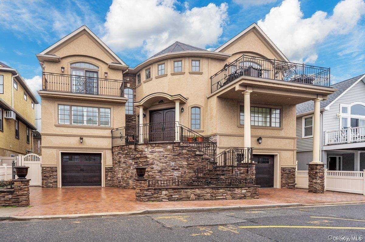Luxurious Living By The Beach in this Uniquely Custom Built Mediterranean Style Home.