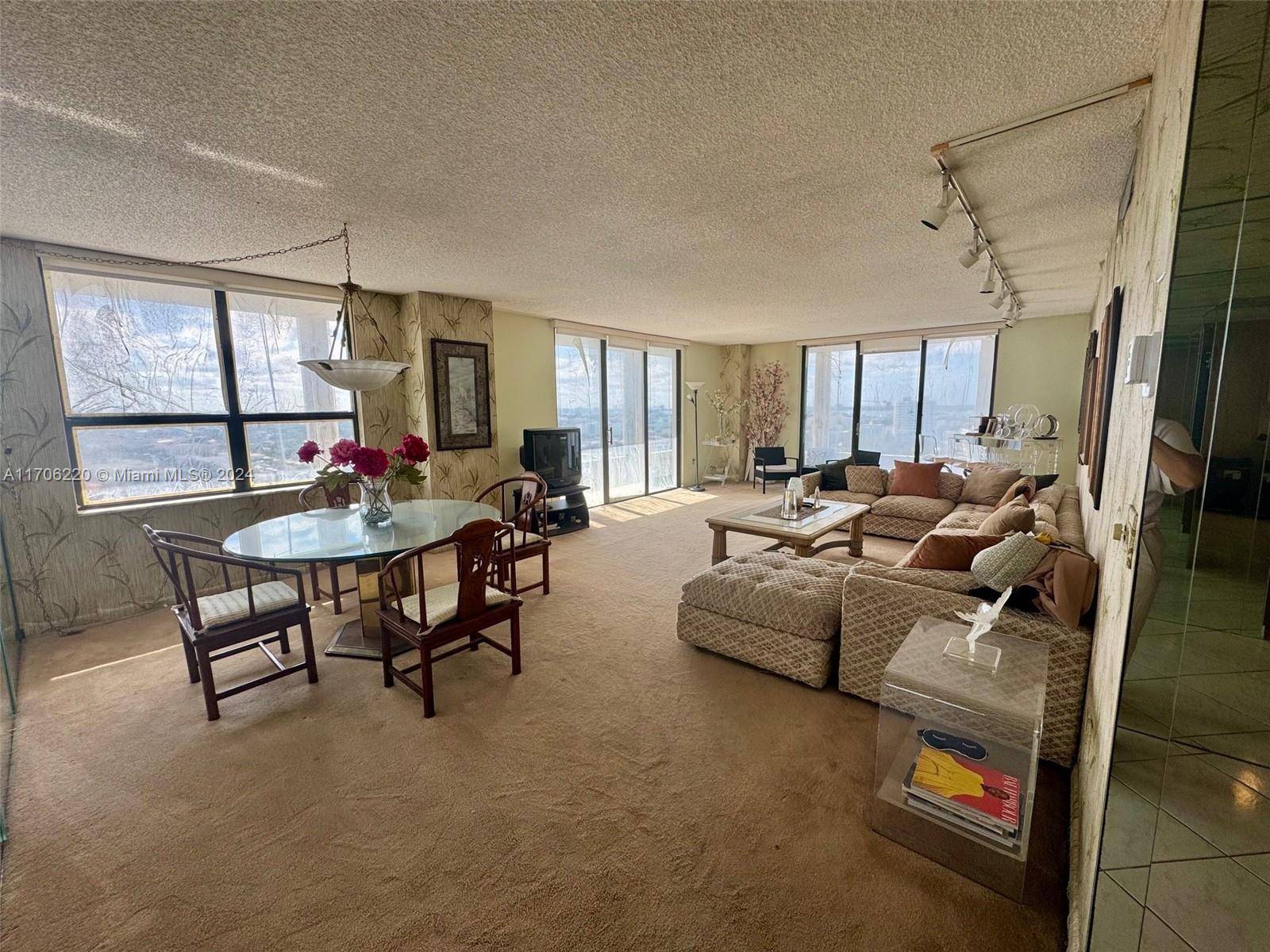 Just reducRARE South West CORNER wrap around balcony Extraordinary views of the ocean and the intra coastal all the way to downtown Miami New glass balcony enclosure on the way, ...