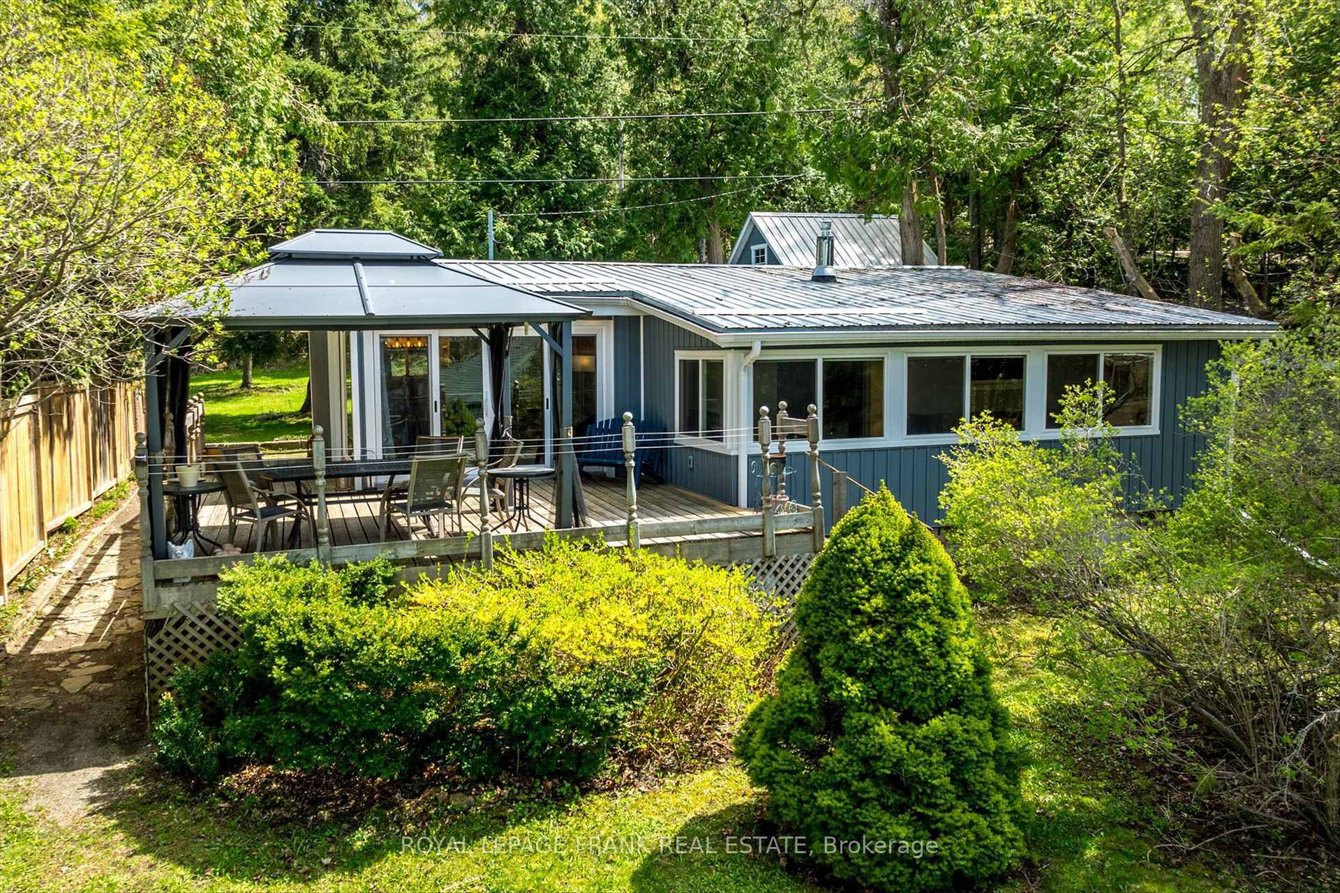 Rare offering 4 Season Cottage Home with direct view of Sturgeon Lake, on a large 0.