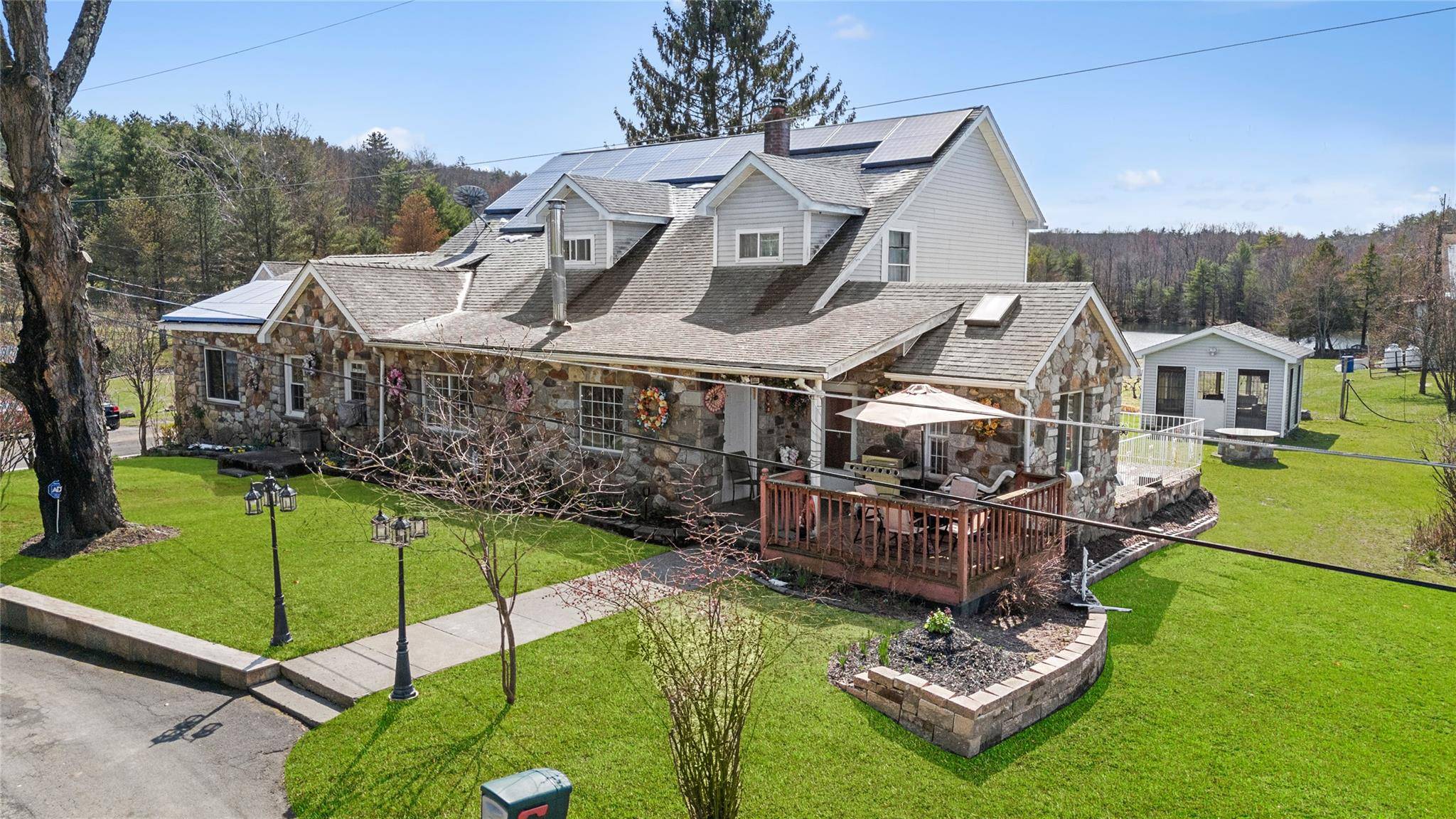 Welcome to 60 62 Stony Rd in Accord, a single family residence with income generating rentals spread out over 2 separate land parcels.