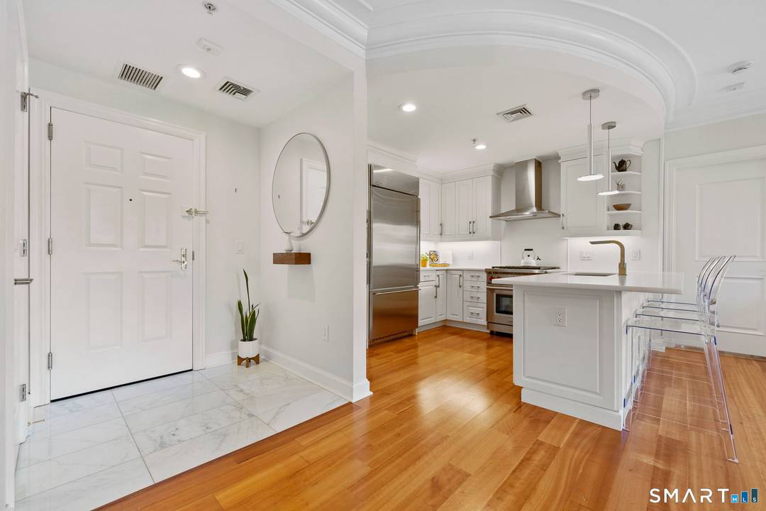 Experience the pinnacle of Blue Back Square luxury in this meticulously renovated masterpiece.