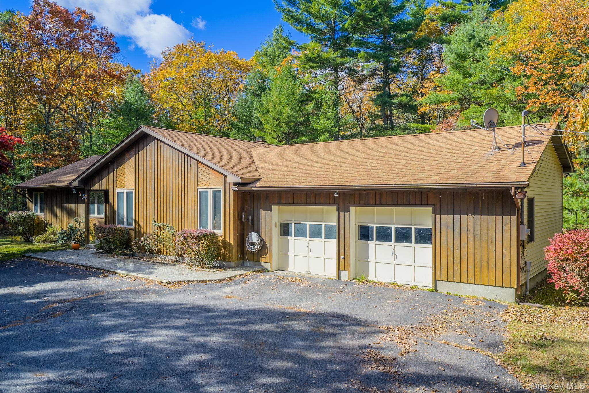 Catskills Retreat on 5 Private Acres 44 Florio Earl Road, Wurtsboro, NY Tucked away at the very end of a quiet road, 44 Florio Earl Road offers the perfect blend ...