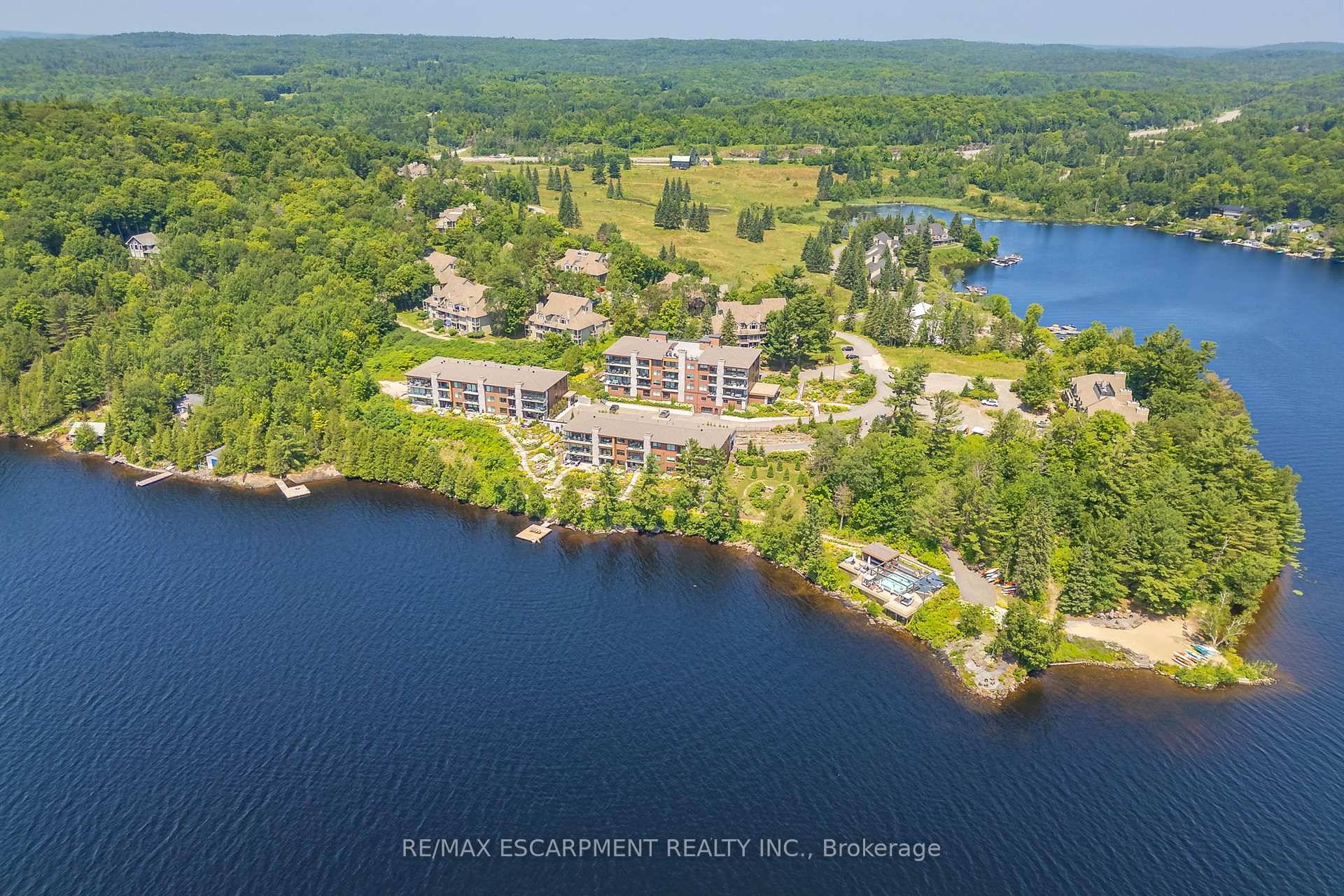 VIEWS ! ! ! ! ! Welcome to 131 Grandview Hilltop Drive, Unit 1 a rare end unit furnished bungaloft offering stunning views of Fairy Lake.