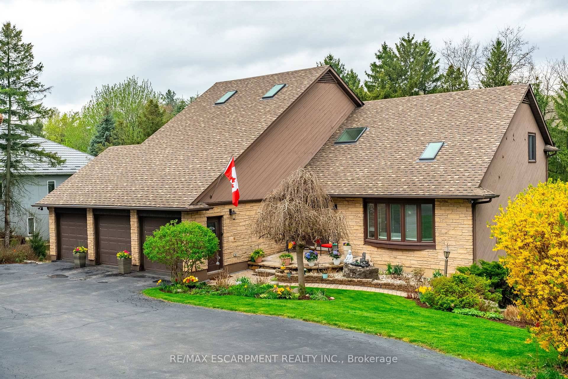 Your dream home awaits at this custom built 3, 000 square foot masterpiece nestled on a generous half acre lot.