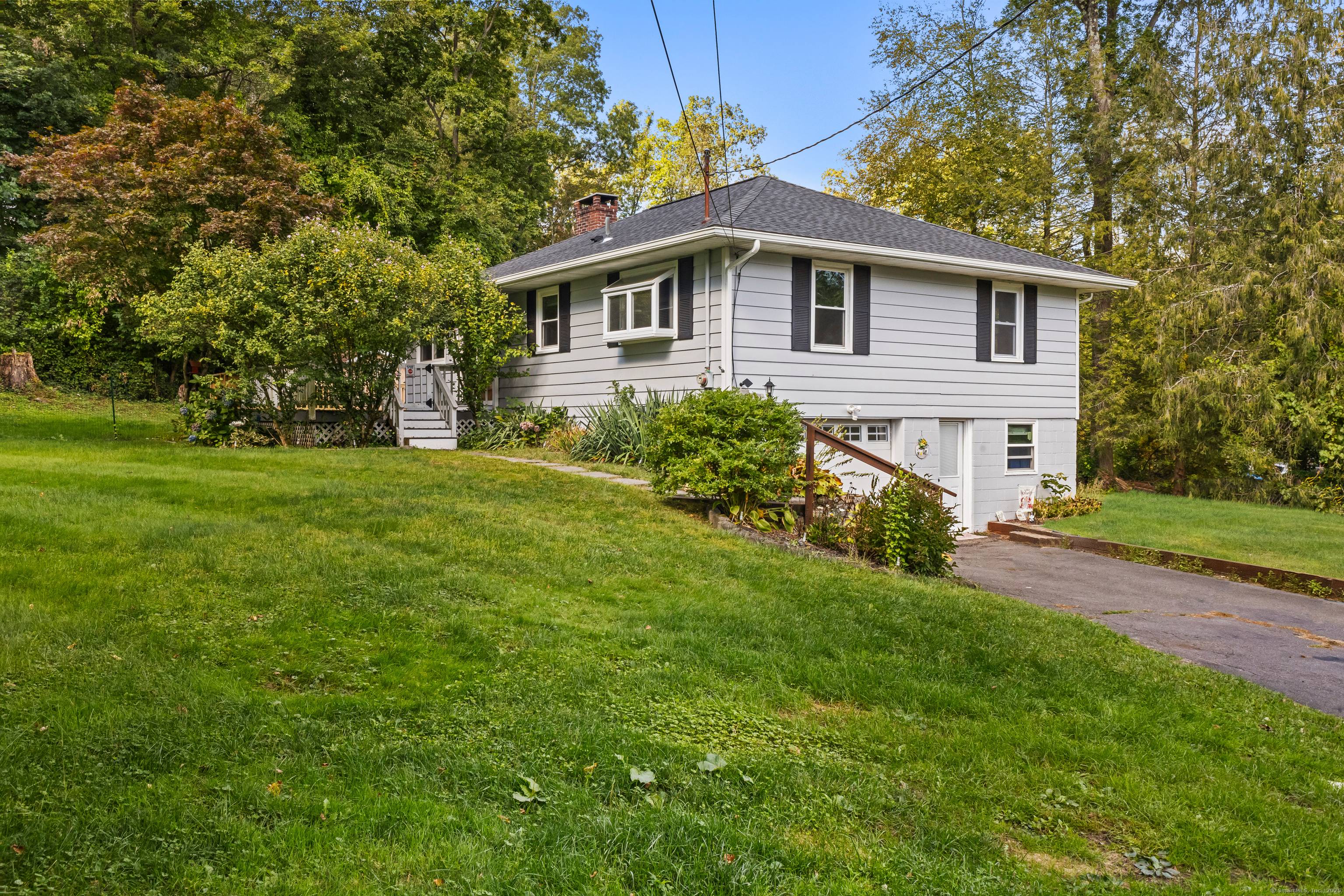 Wooded Retreat With Style and Charm Located in the highly sought after town of New Fairfield, this two bedroom, two bathroom house offers approximately 1, 718 square feet of living ...