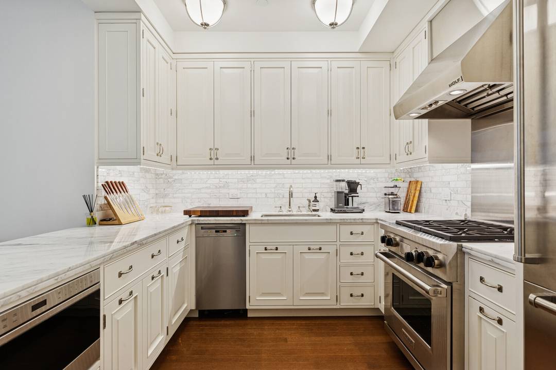 The Greenwich Lane. This gracious 1 BR, 1 Ba residence on West Twelfth Street offers southern exposure over the central garden through newly enlarged, double hung mullioned windows.