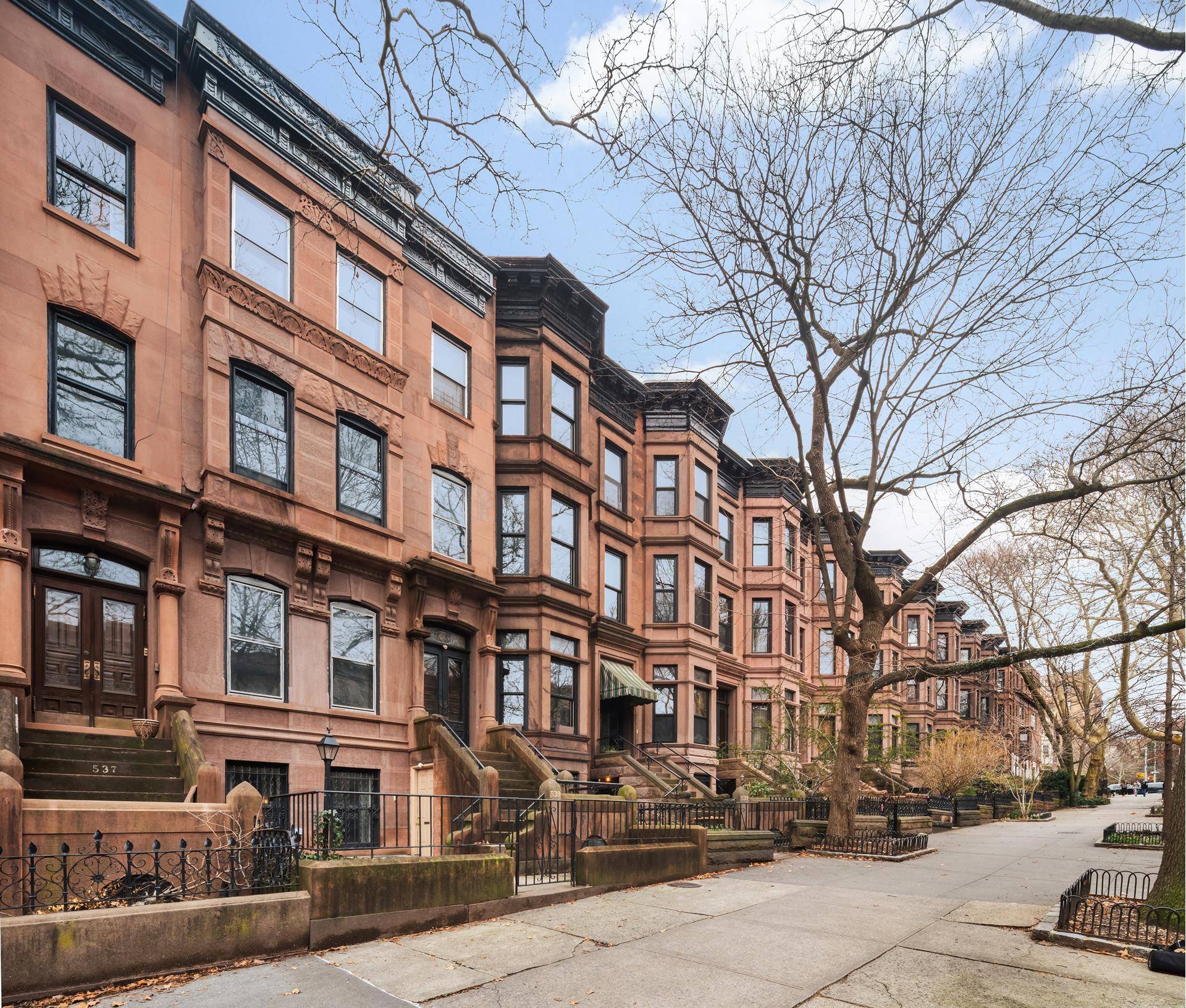 This prime Park Slope brownstone offers a blend of historic charm and modern comforts.