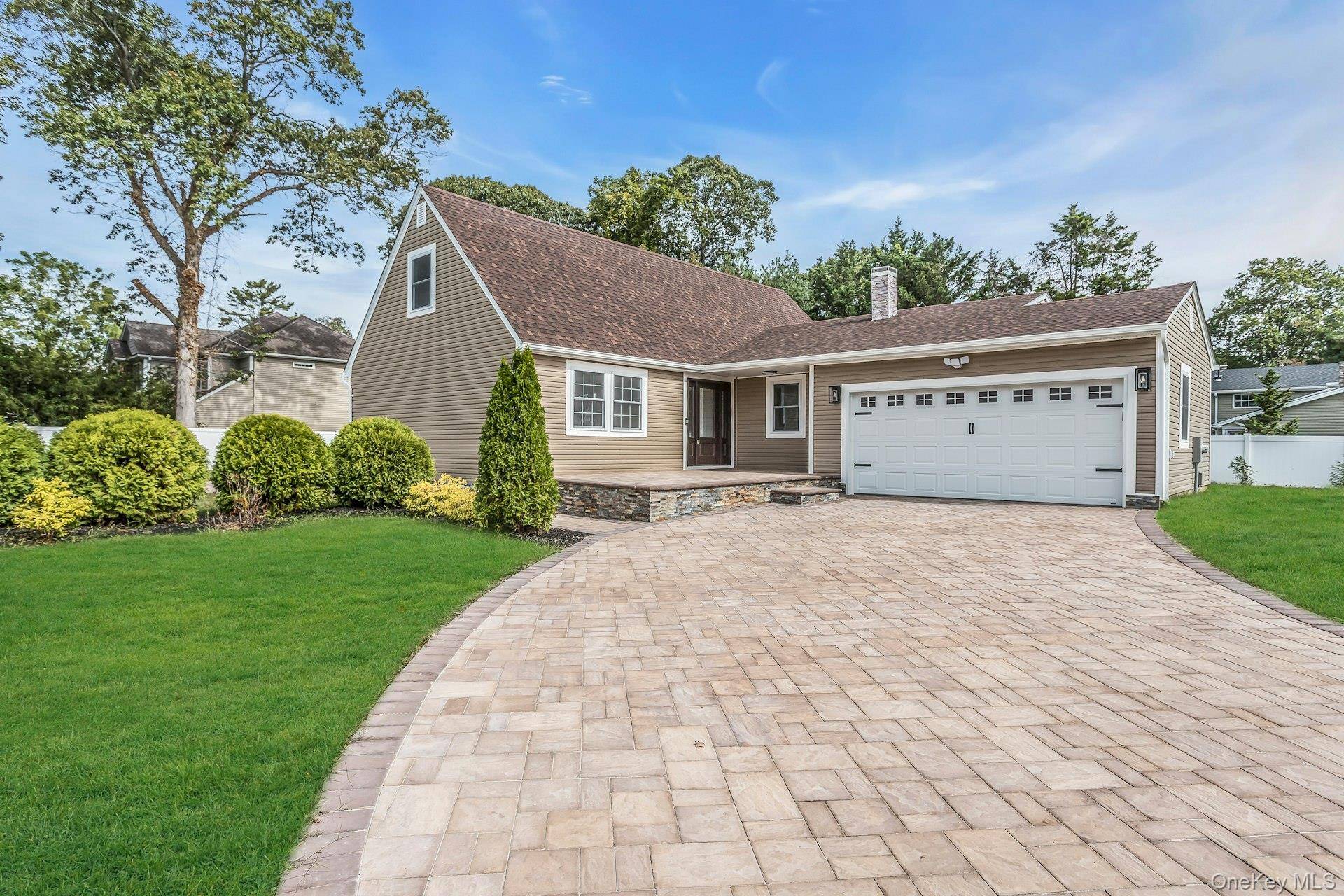 Luxuriously renovated 5 bedroom and 4 bathroom 2 family duplex boasting over 4, 300 sq ft of legal living space on a private half acre cul de sac.