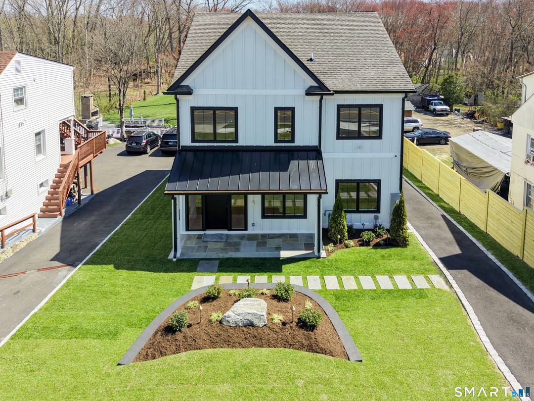 Stunning NEW CONSTRUCTION in the centrally located Springdale neighborhood of Stamford, CT.