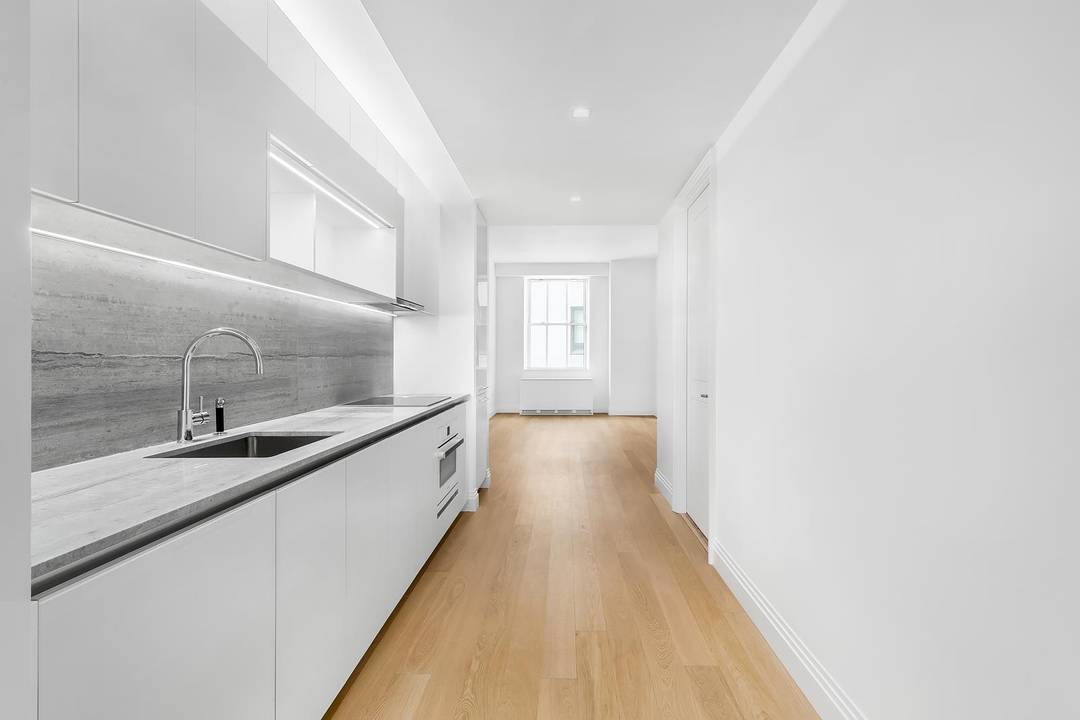 Move In Ready ! Residence 1129 is an alcove studio with home office at One Wall Street.