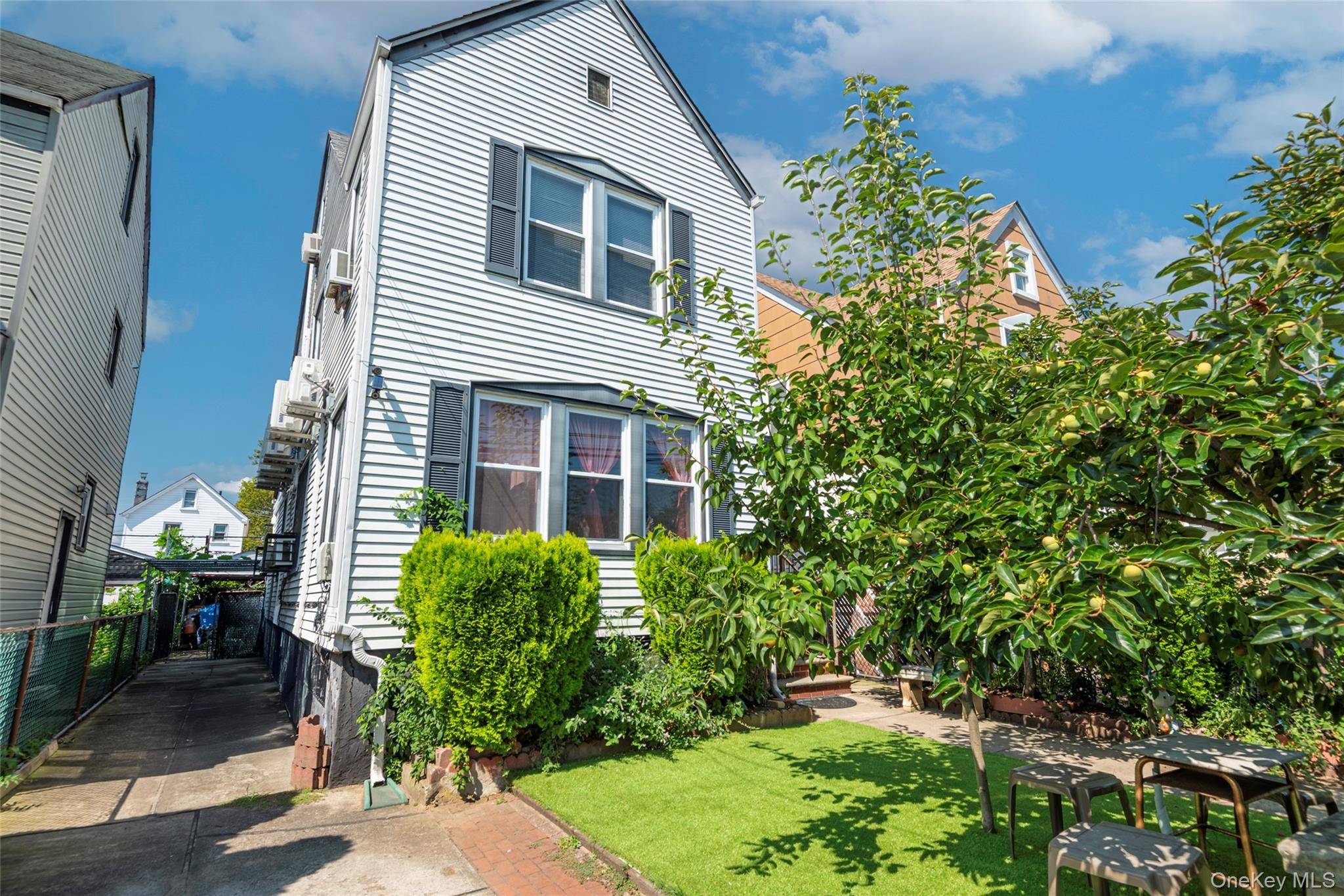 Charming 2 family home on a quiet, tree lined street.