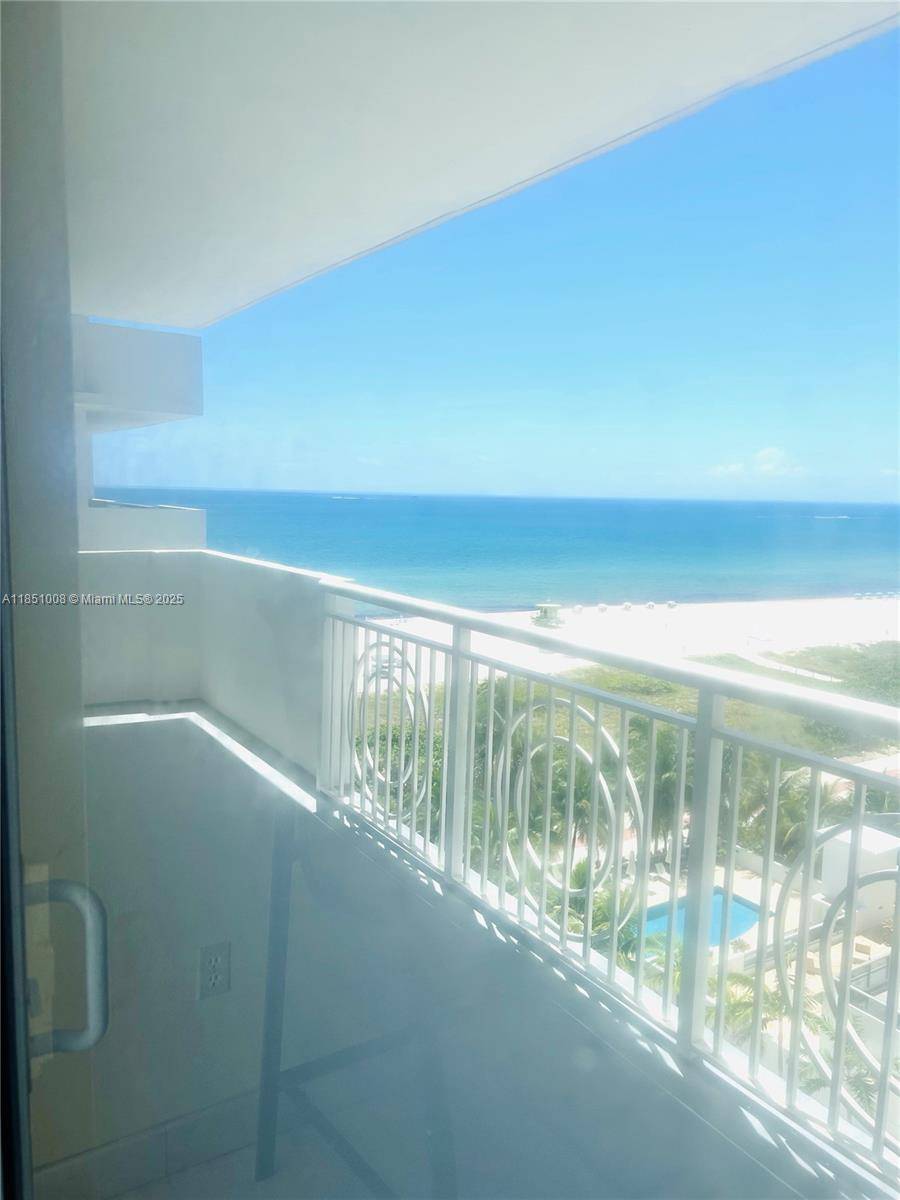 Spacious 2 bedrooms den 2 baths on prestigious Millionaires Row, beach and pool view.