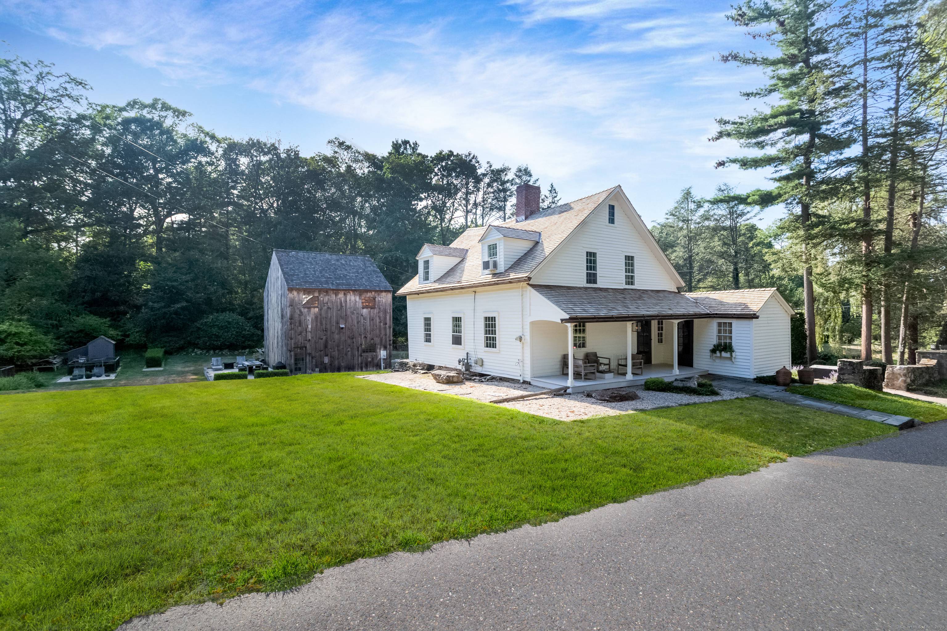 The Sherwood Farmhouse set in Southport's Mill Hill area, Circa 1720, is tucked away on a picturesque.