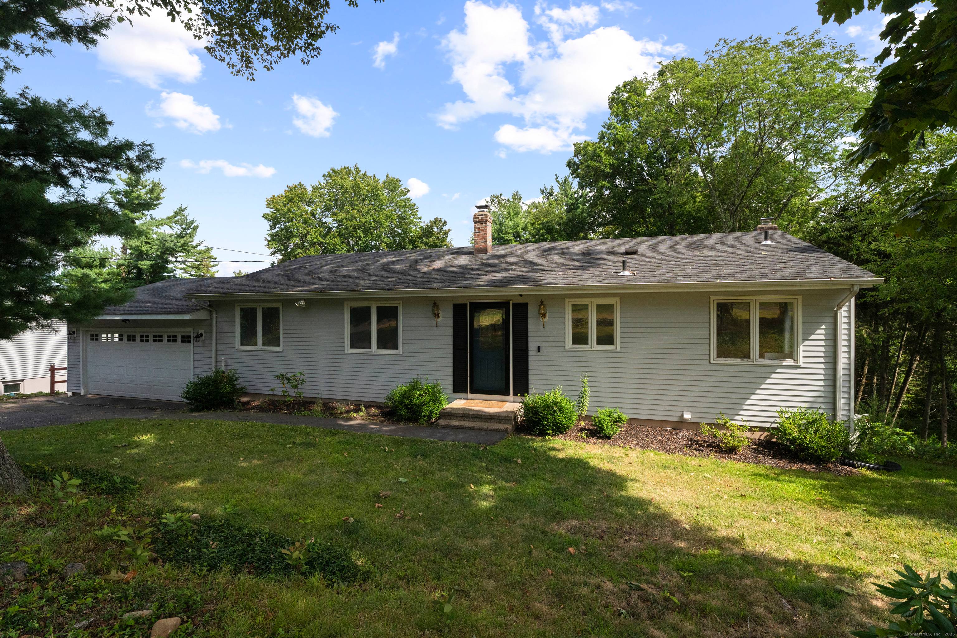 Welcome to this inviting 3 bedroom, 2 bath ranch in the heart of North Haven !