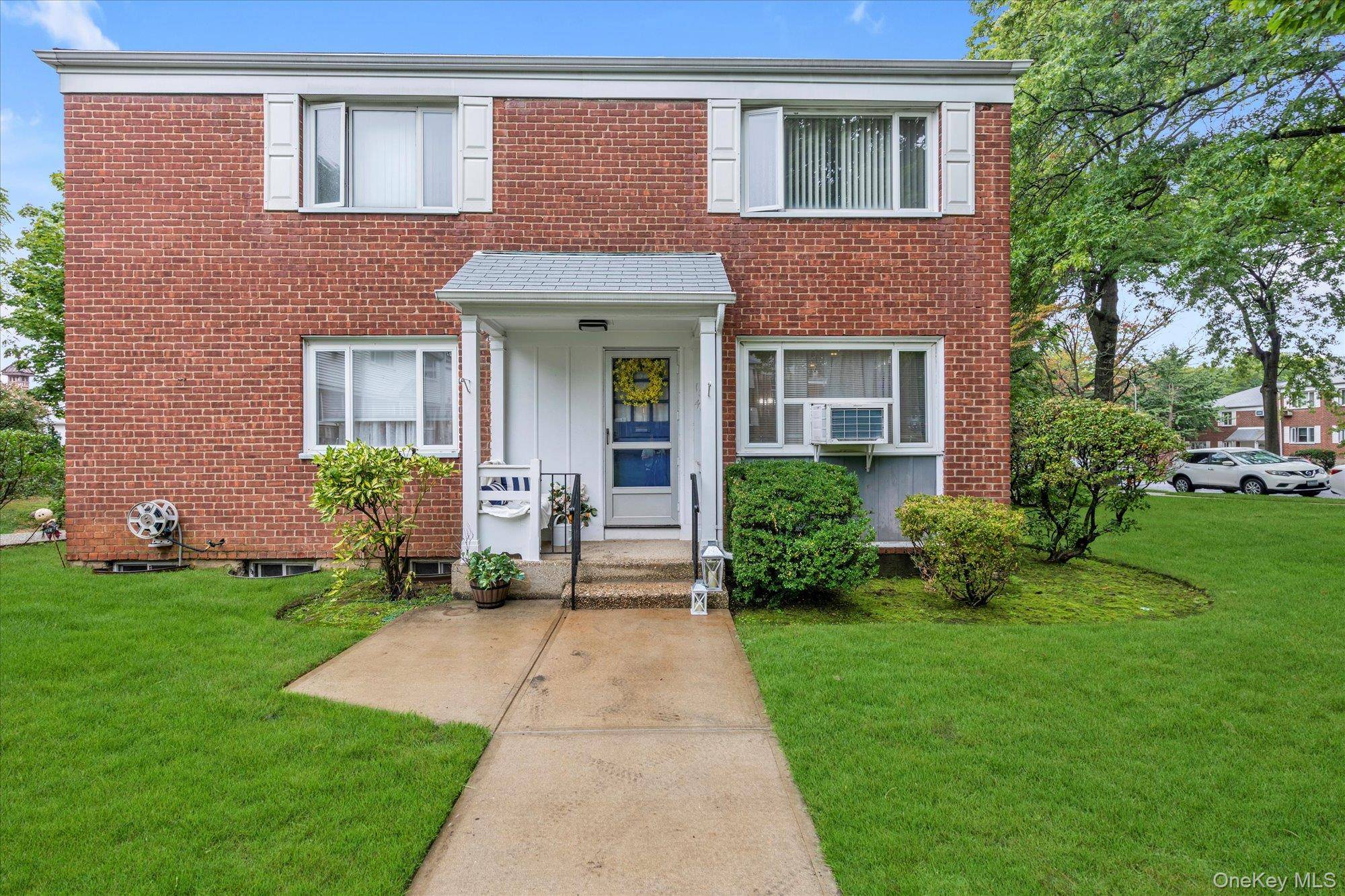 Welcome to this garden level 2 bedroom cooperative in the highly sought after Bay Terrace Gardens community.