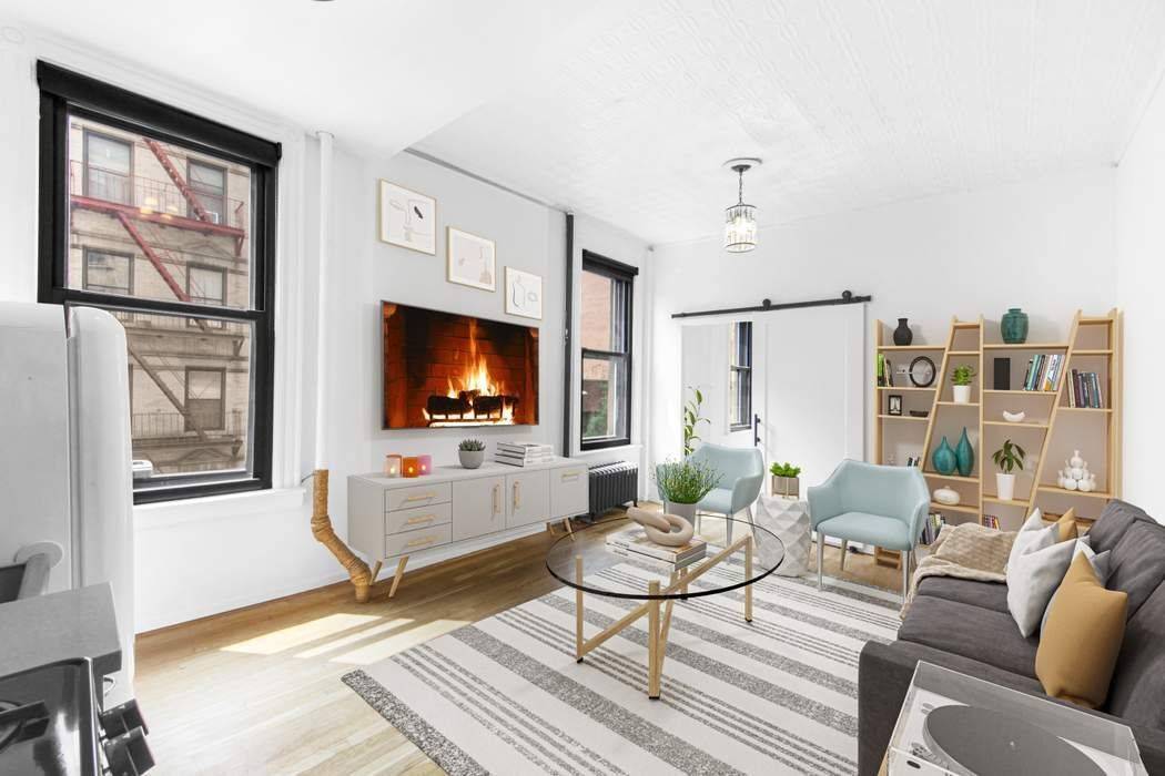 Bright corner one bedroom apartment where prime Soho meets Nolita, at the corner of Spring Street and Mulberry Street.
