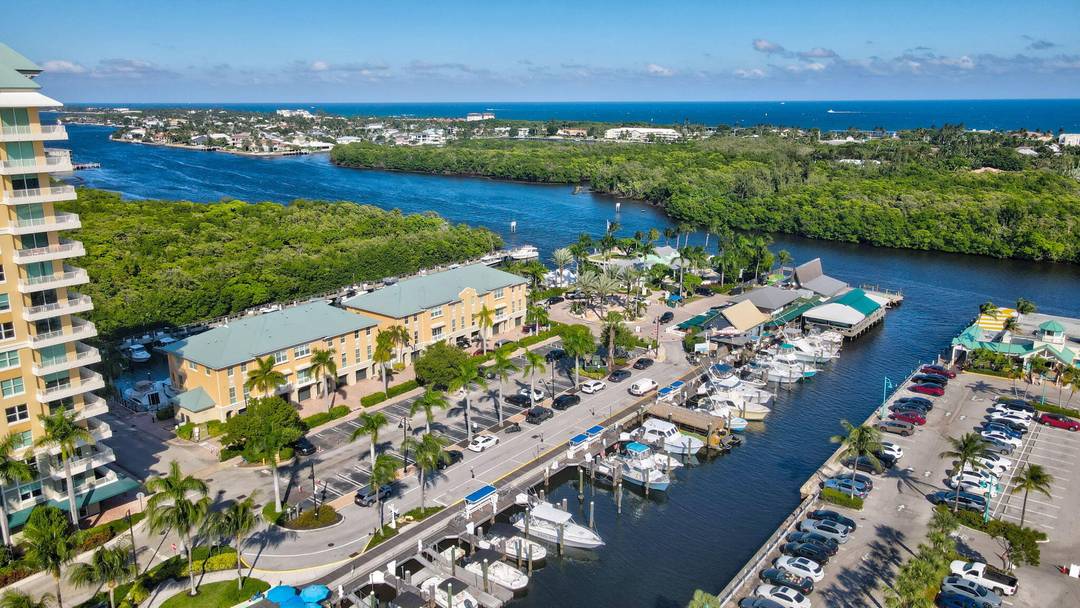 Stunning Marina Village townhouse with intracoastal views and direct access to private dock !