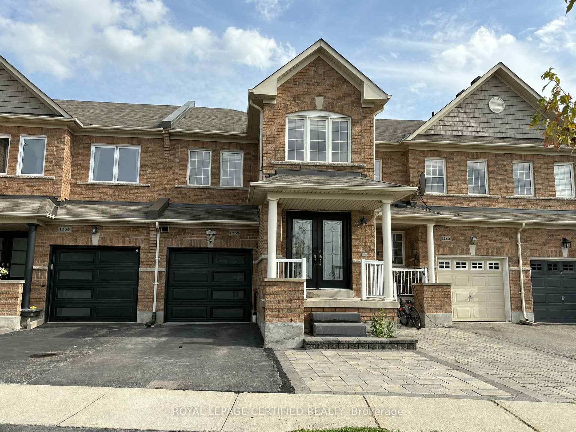 Gorgeous townhouse offering approximately 2, 700 sq ft of living space.