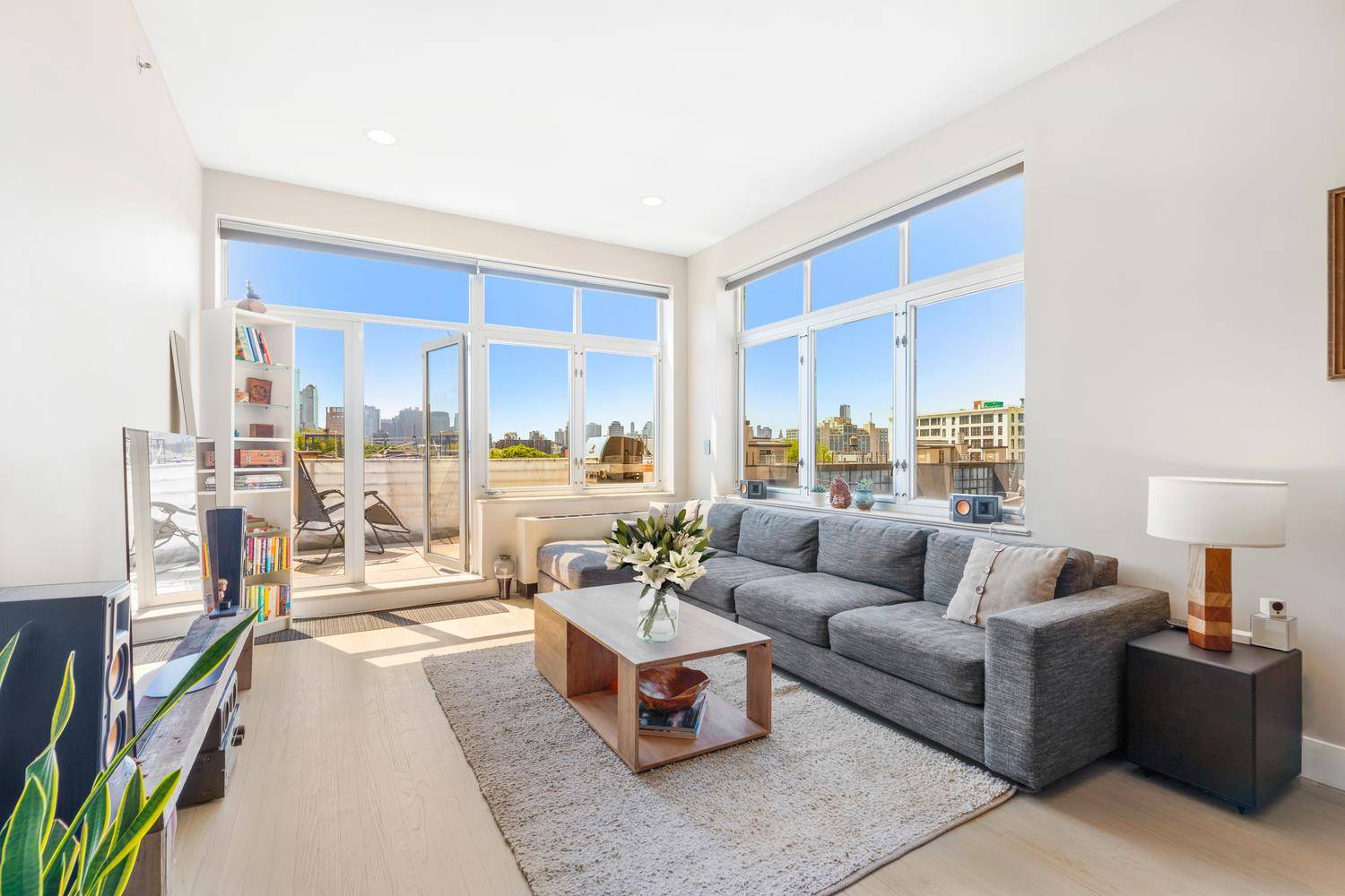 Motivated Seller ! ! ! Live large in this lofty 1 Bedroom Condo with 2 private outdoor spaces in The Clinton Lofts.