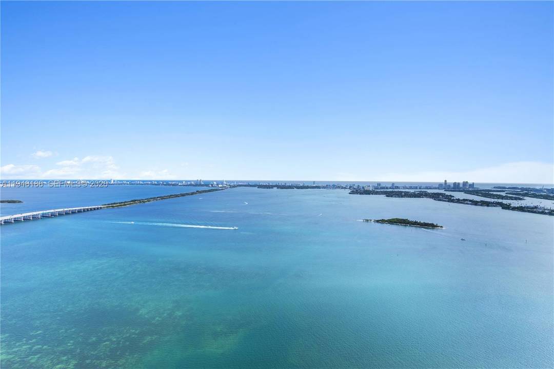 Perched on the 47th floor, elegantly finished Edgewater residence captures uninterrupted panoramas of Biscayne Bay and the Atlantic, offering a true sense of elevation and escape above the city.