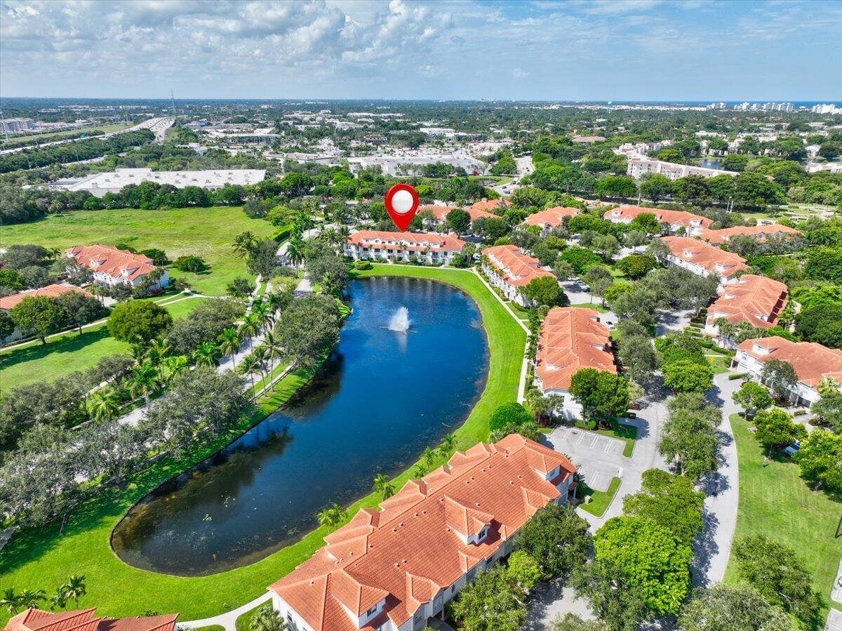 STUNNING LONG LAKE VIEWS Rare opportunity in a sought after award winning gated East Delray community.