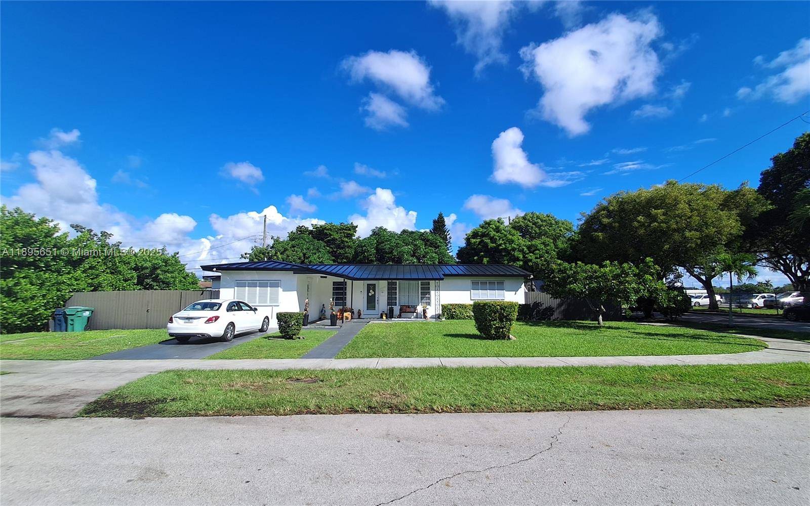 Beautiful 3 2 home in one of Miami's most desirable neighborhoods, with a living room, dining room, separate kitchen, Additional room with separate kitchen, bathroom and separate entrance.