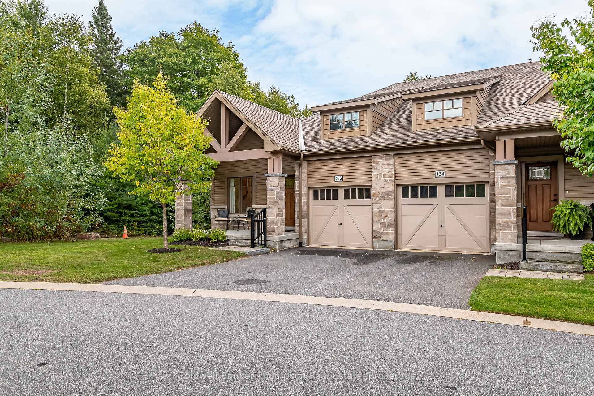 This end unit bungalow townhouse by Devonleigh Homes blends timeless curb appeal with thoughtful interior design.