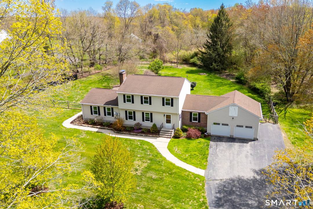 Set on over two private acres, this versatile and beautifully maintained home offers space, flexibility, and thoughtful upgrades throughout.