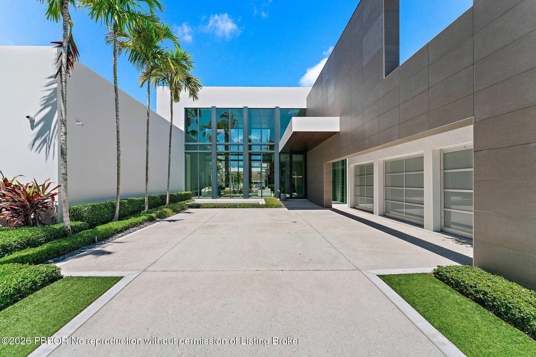 A Masterpiece of Modern Luxury, this residence represents International Style architecture at its finest, defined by clean lines organic materials.