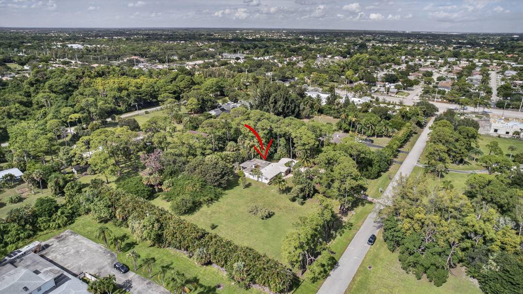 Nearly 100, 000 sq ft of land in Palm Beach Gardens NO HOA, RE Residential Estate zoning, and one of the larger and more desirable lots in all of Square ...
