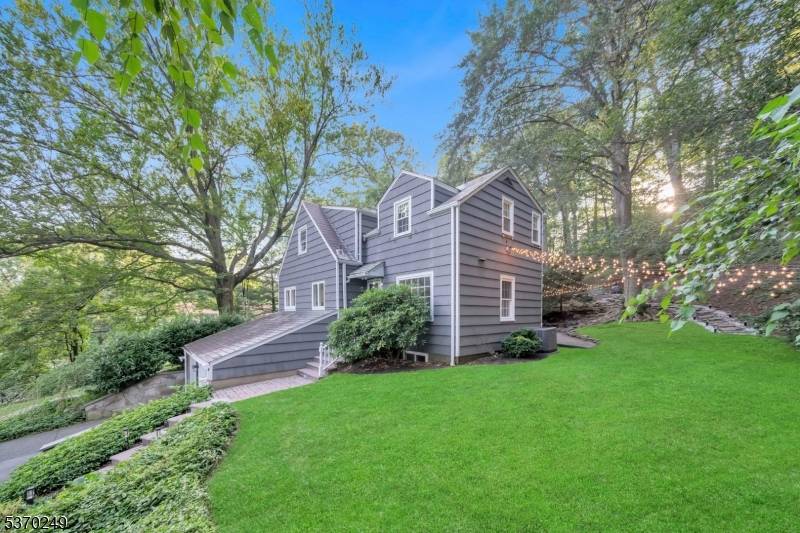 Located on one of MOUNTAINSIDE'S most desirable cul de sacs, this stunning custom Colonial Home spans three levels of beautifully finished living space.
