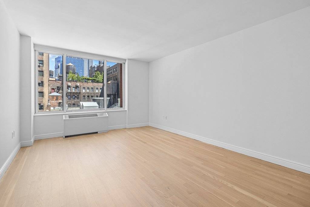 Welcome to this stunning one bedroom residence, featuring a large living space, king sized bedroom, and pass thru kitchen with granite countertops and stainless steel appliances.