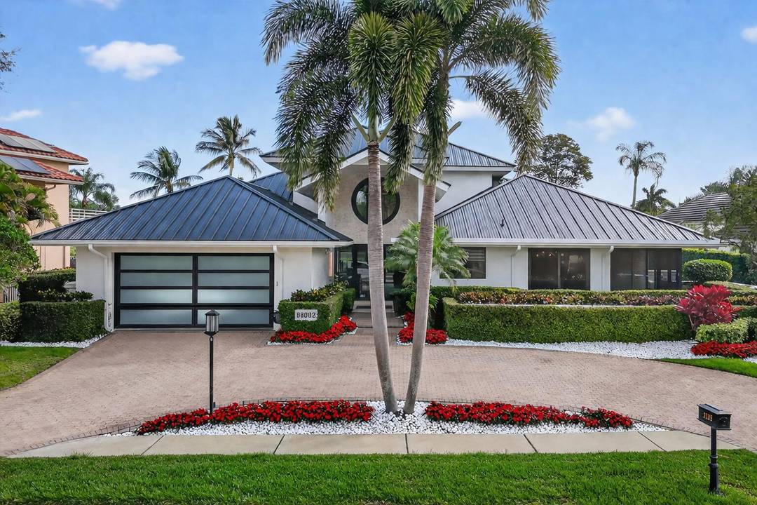 Fully Reimagined Luxury Golf Course Estate on the 13th Fairway in Gated Boca Grove.