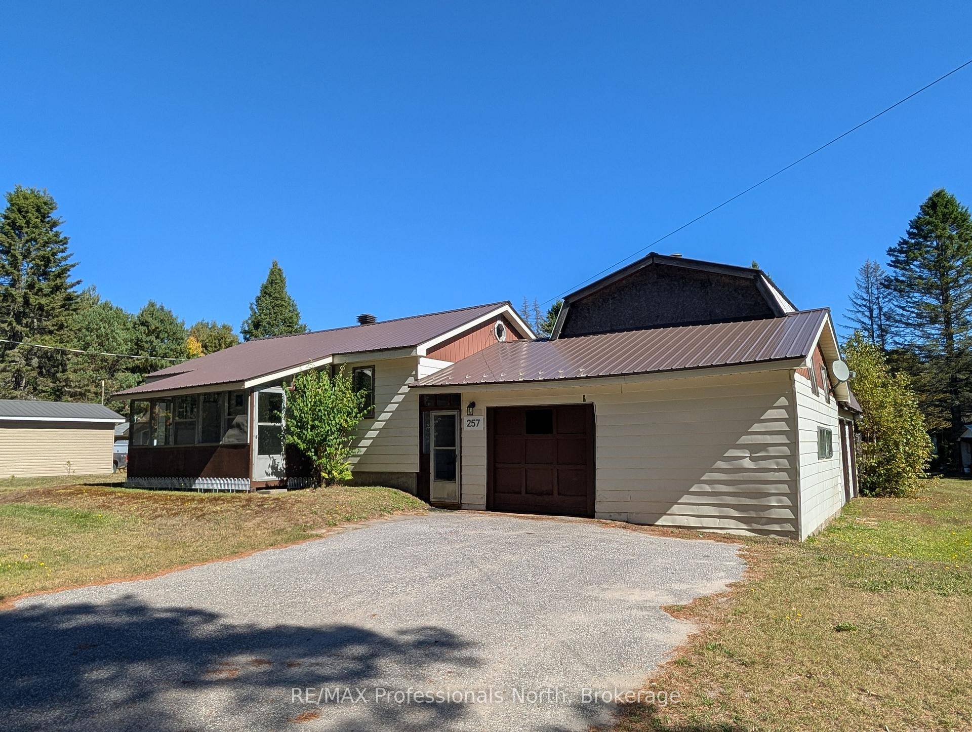 Excellent opportunity to own this 3 bedroom home with attached garage workshop, located on an oversize lot at the edge of town, with a huge shop.
