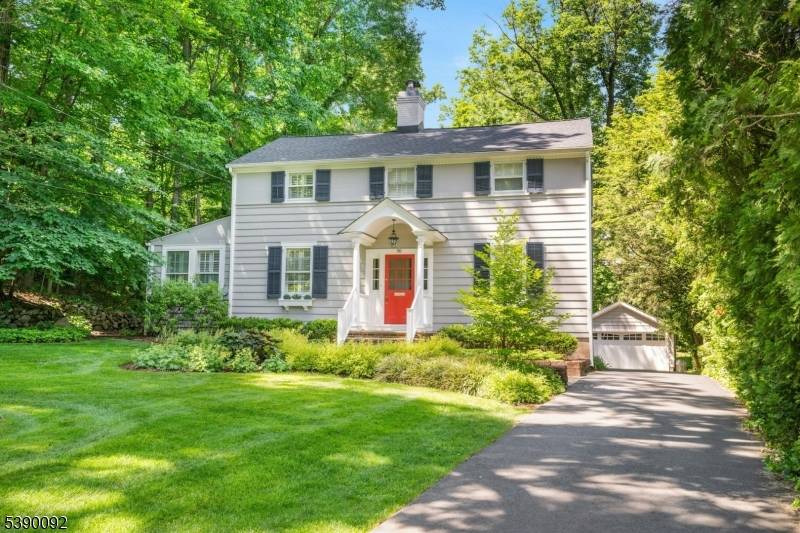 Welcome to this timeless Center Hall Colonial on a beautiful tree lined street in Summit's coveted Northside.