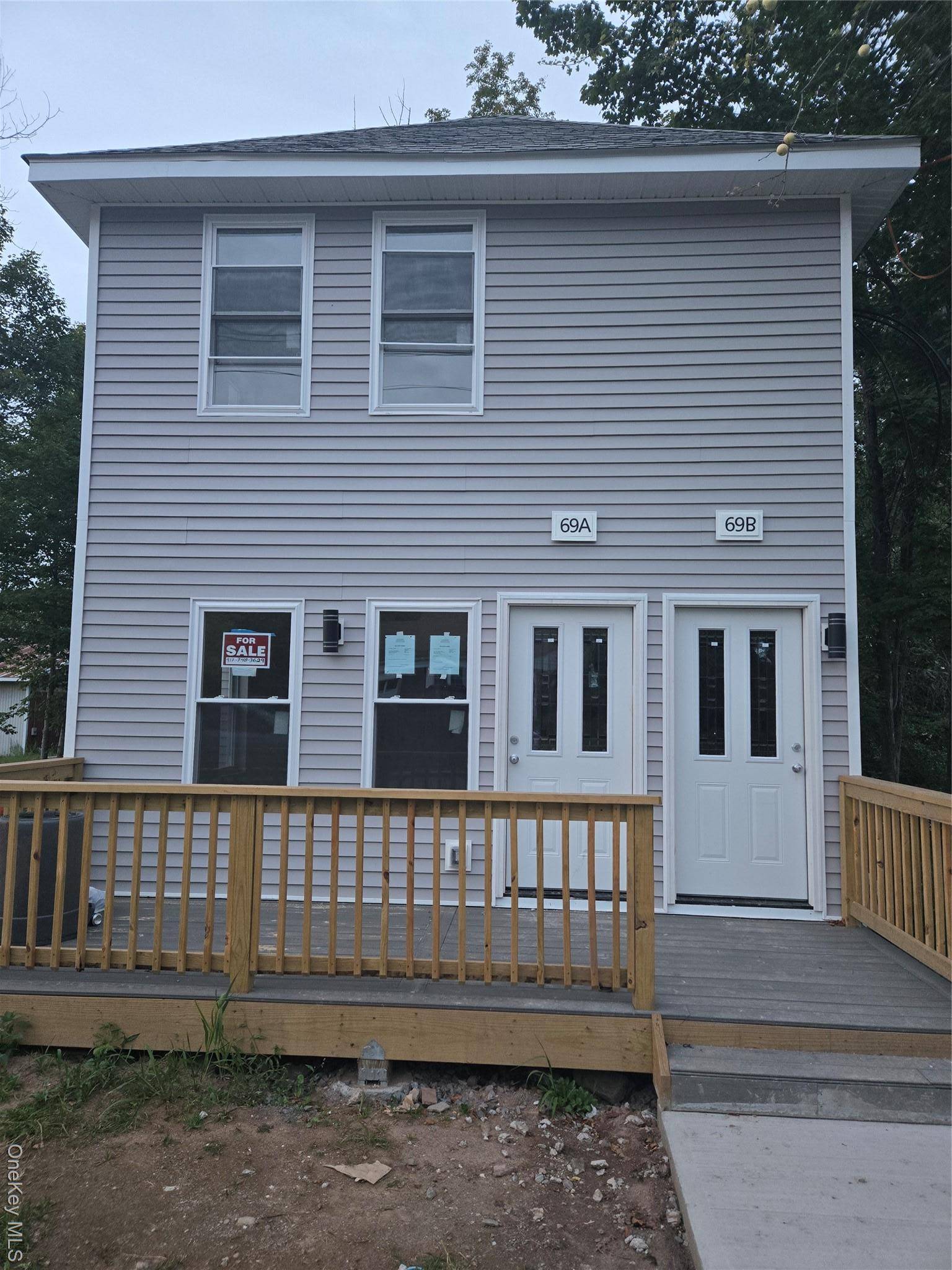 Beautiful newly renovated 2 family in Woodridge.