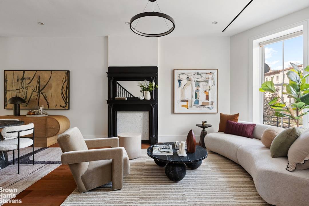 210 Macon Street is a beautifully restored 3 story brownstone nestled on one of Bed Stuy's most picturesque blocks.