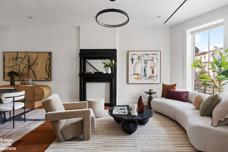 210 Macon Street is a beautifully restored 3 story brownstone nestled on one of Bed Stuy's most picturesque blocks.