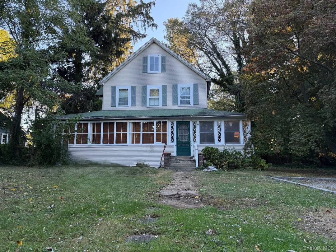 Colonial Style Home. This Home Features 3 Bedrooms, 1.