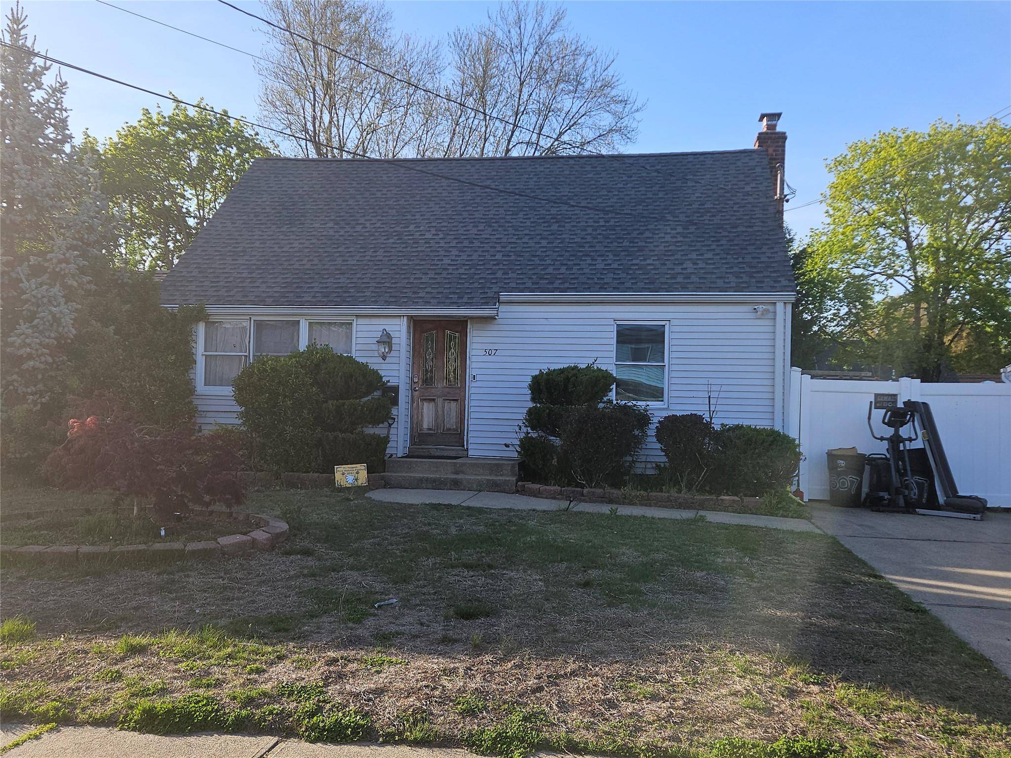 Cape with an extension in the rear of the house, it needs TLC, investors delight