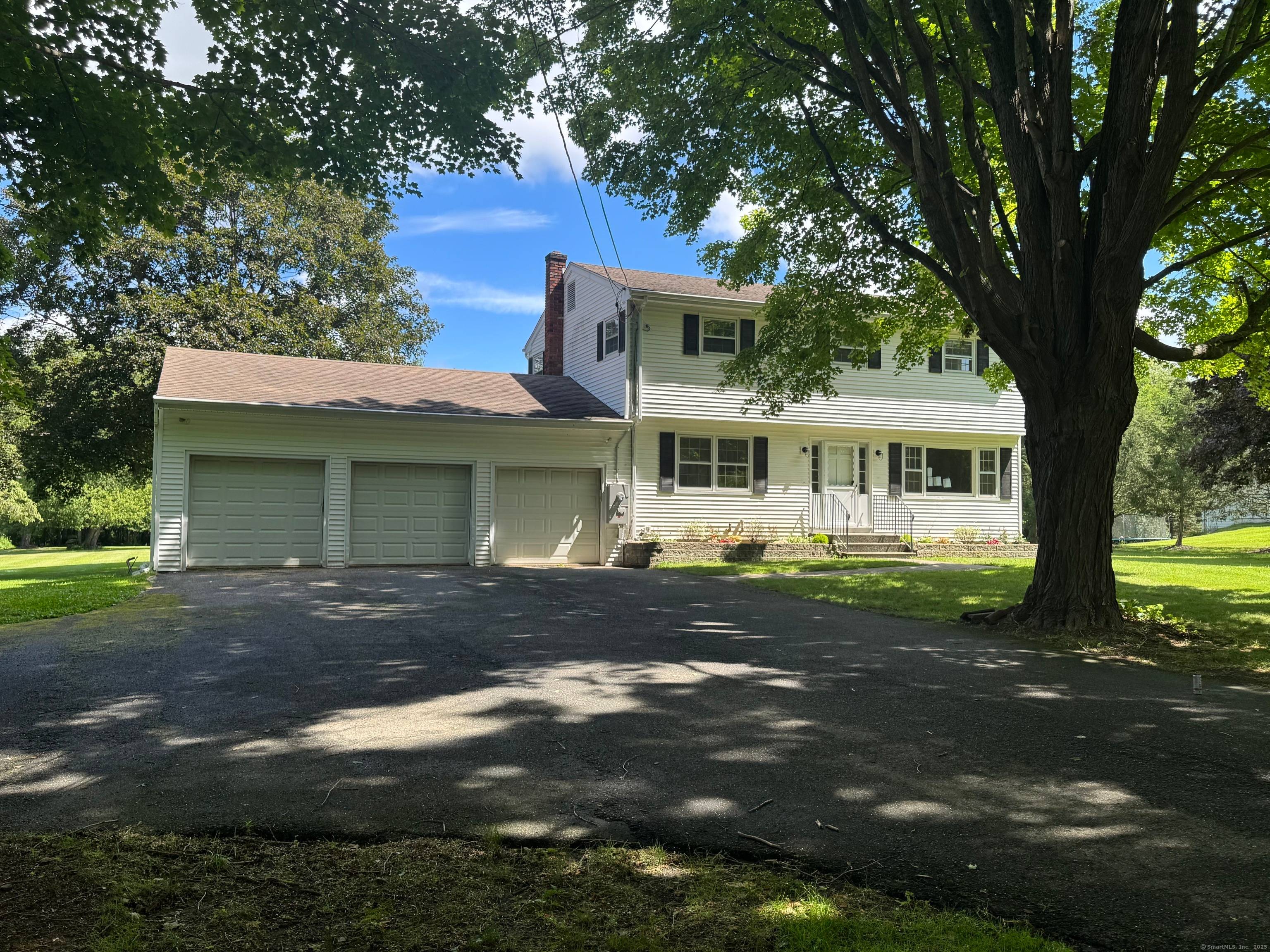 Welcome to 408 Hut Hill Road, where timeless charm meets modern convenience in this beautifully reimagined 4 bedroom, 2.