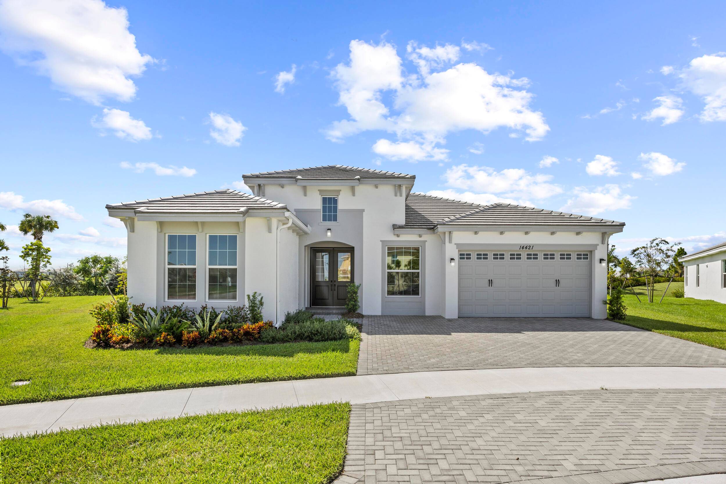 Live the luxury lifestyle in this brand new, never lived in Sanderling Grand model located in the sought after community of Westlake, Florida.