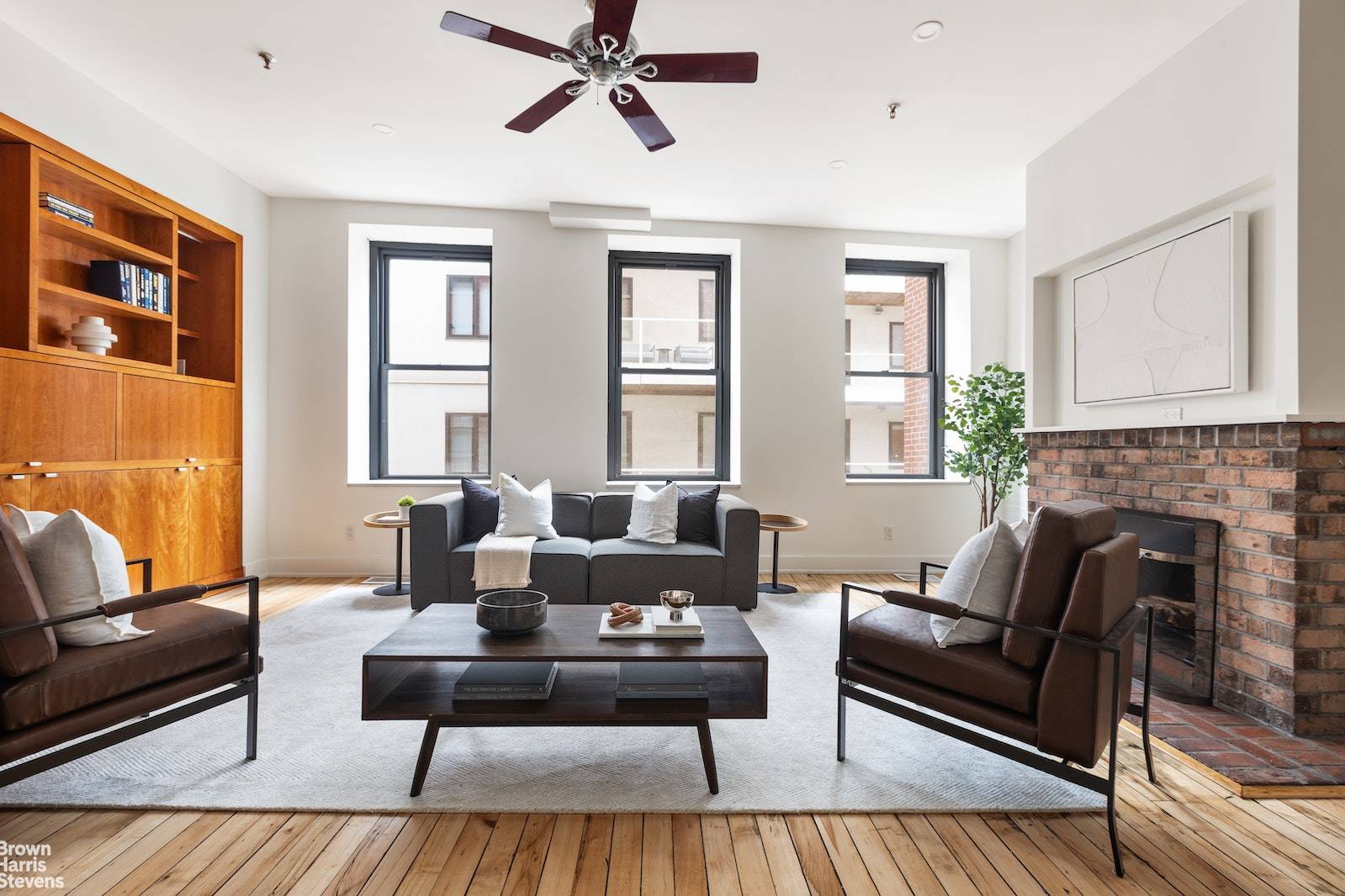 Welcome to 130 Jane Street, apartment 2 3K, a truly exceptional West Village duplex that seamlessly blends modern luxury with old world industrial charm.