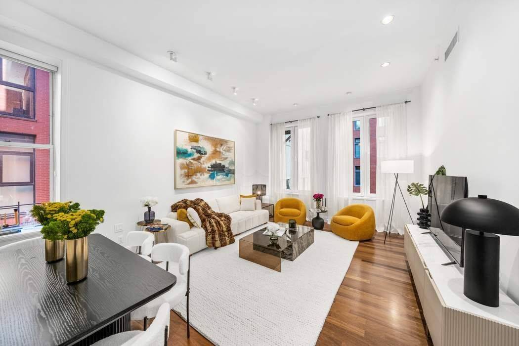 Discover the pinnacle of loft style living in this serene pin drop quiet apartment at esteemed River Lofts Condominiums in Tribeca.