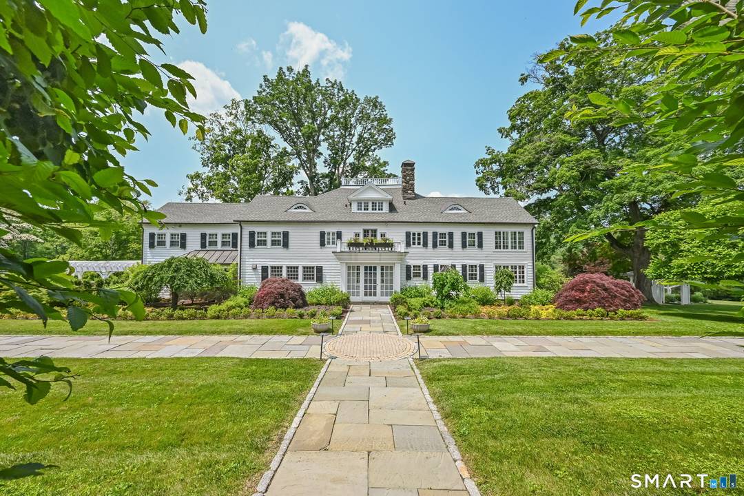 Set across 53 gated acres in Northern Fairfield County, this exceptional estate offers a remarkable combination of privacy, scale, and natural beauty, just minutes from Ridgefield, approximately 10 minutes from ...